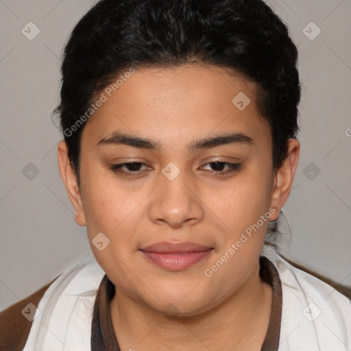 Joyful latino young-adult female with short  brown hair and brown eyes