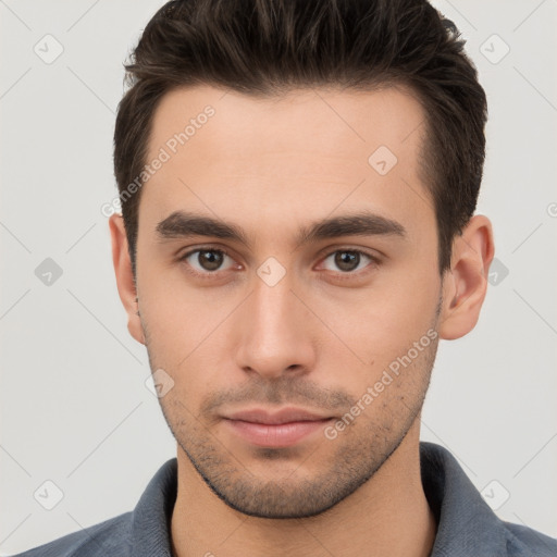 Neutral white young-adult male with short  brown hair and brown eyes