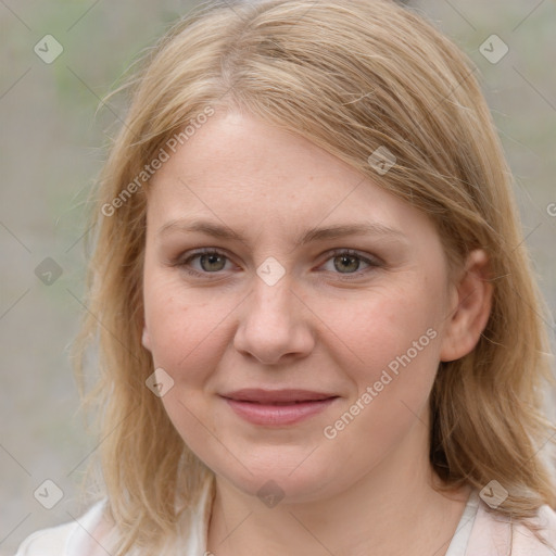 Joyful white young-adult female with medium  brown hair and blue eyes