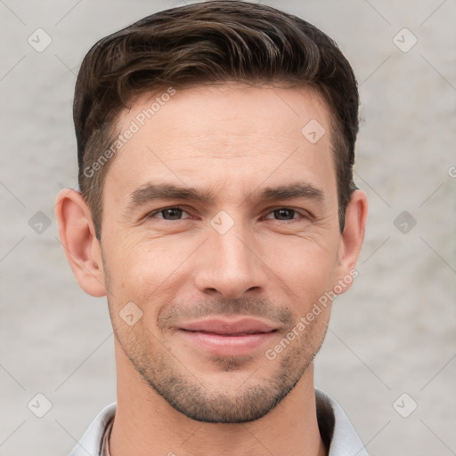 Joyful white young-adult male with short  brown hair and brown eyes