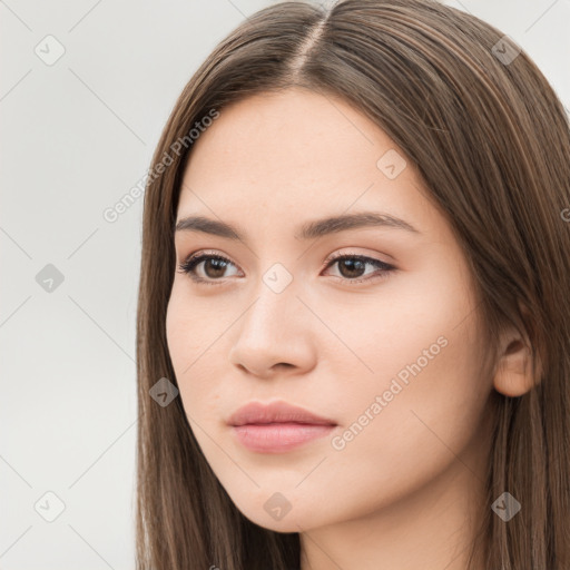 Neutral white young-adult female with long  brown hair and brown eyes