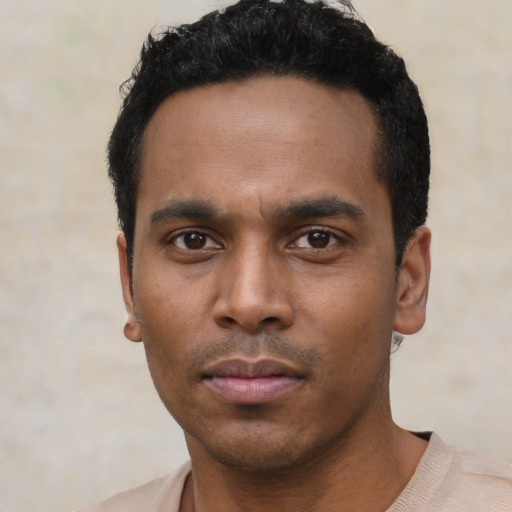 Neutral latino young-adult male with short  black hair and brown eyes