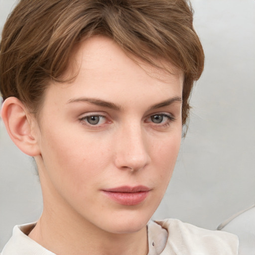 Neutral white young-adult female with short  brown hair and brown eyes