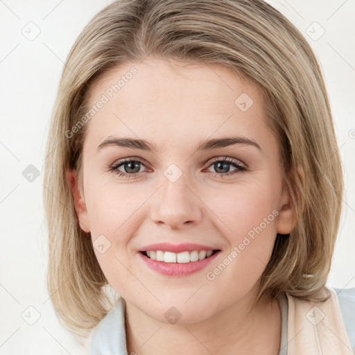 Joyful white young-adult female with medium  brown hair and blue eyes