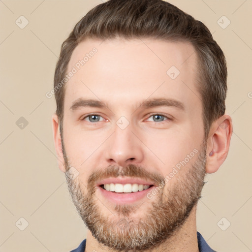 Joyful white young-adult male with short  brown hair and brown eyes