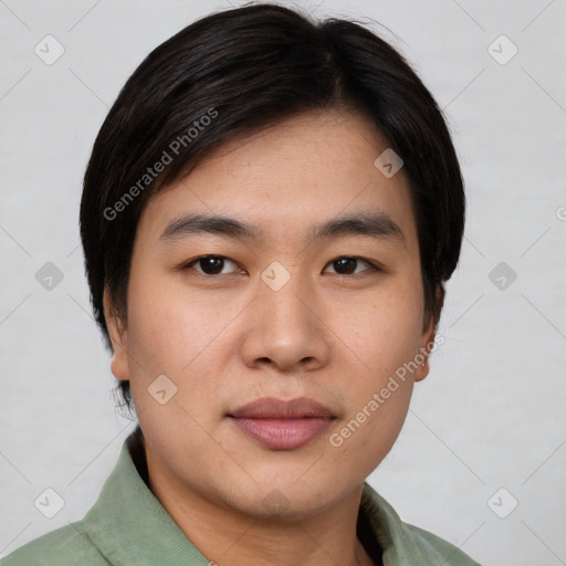 Joyful asian young-adult male with short  black hair and brown eyes