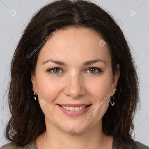 Joyful white young-adult female with medium  brown hair and green eyes