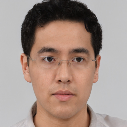 Neutral asian young-adult male with short  brown hair and brown eyes