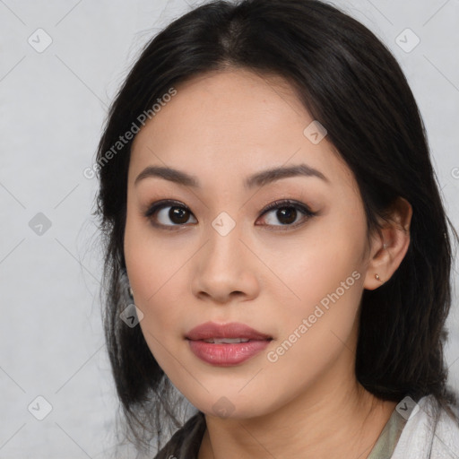 Joyful latino young-adult female with medium  black hair and brown eyes