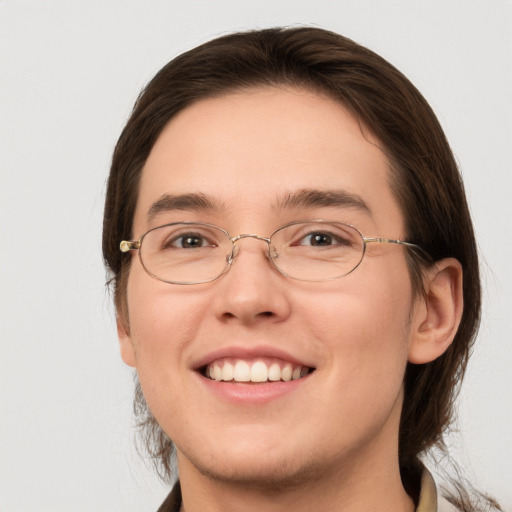 Joyful white young-adult female with medium  brown hair and grey eyes