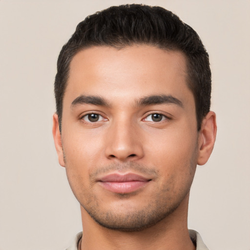 Neutral latino young-adult male with short  black hair and brown eyes