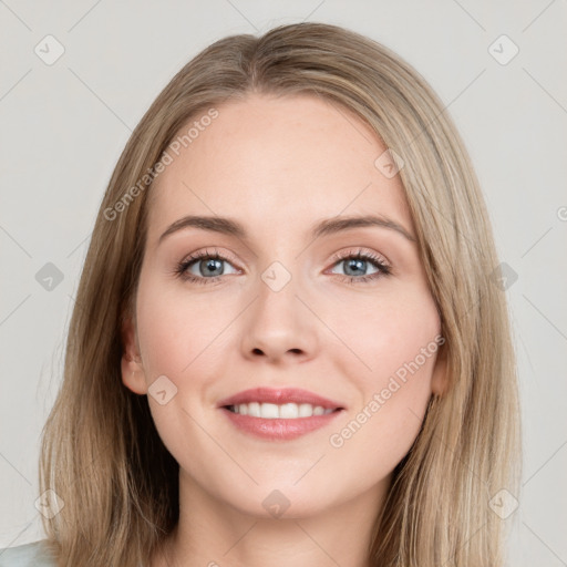 Joyful white young-adult female with long  brown hair and green eyes