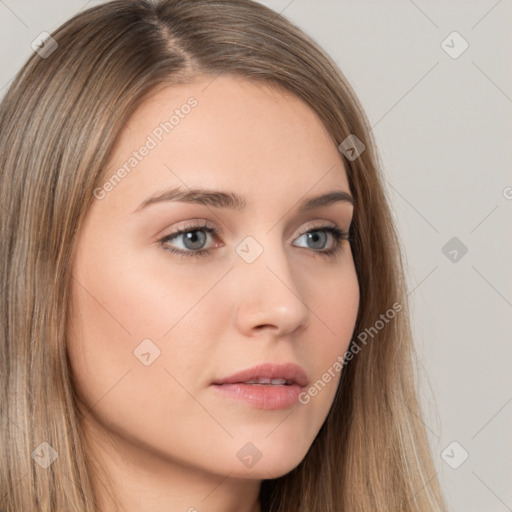 Neutral white young-adult female with long  brown hair and brown eyes