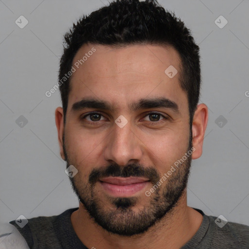 Joyful white young-adult male with short  black hair and brown eyes