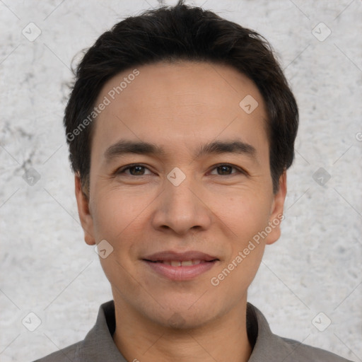 Joyful white young-adult male with short  black hair and brown eyes