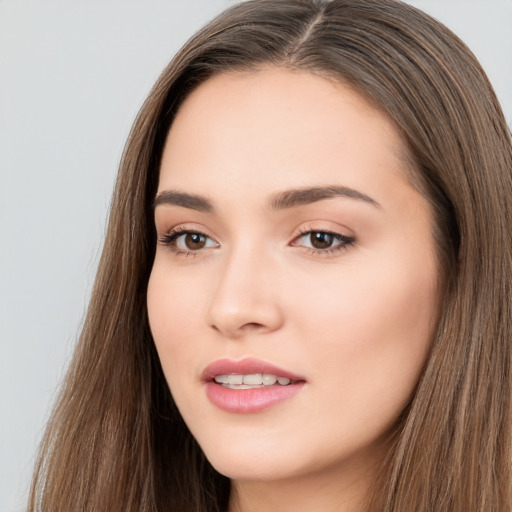 Neutral white young-adult female with long  brown hair and brown eyes