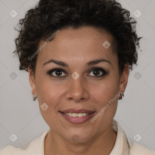 Joyful latino young-adult female with short  brown hair and brown eyes