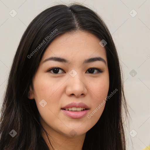 Joyful asian young-adult female with long  brown hair and brown eyes