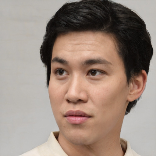 Neutral white young-adult male with short  black hair and brown eyes