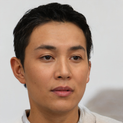 Neutral latino young-adult male with short  brown hair and brown eyes