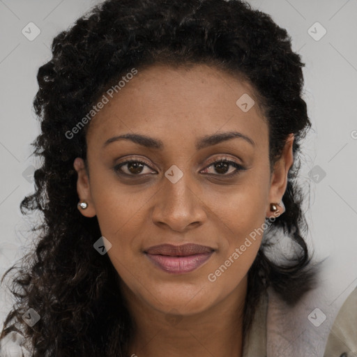 Joyful black young-adult female with long  brown hair and brown eyes