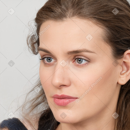 Neutral white young-adult female with medium  brown hair and grey eyes