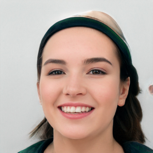 Joyful white young-adult female with medium  black hair and brown eyes