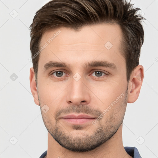 Neutral white young-adult male with short  brown hair and brown eyes