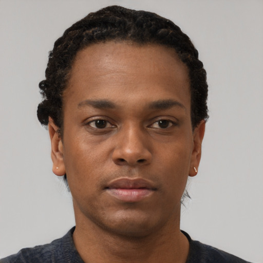 Neutral black young-adult male with short  black hair and brown eyes