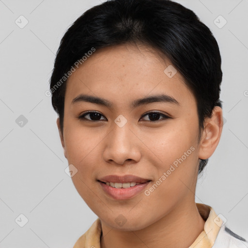 Joyful asian young-adult female with short  black hair and brown eyes