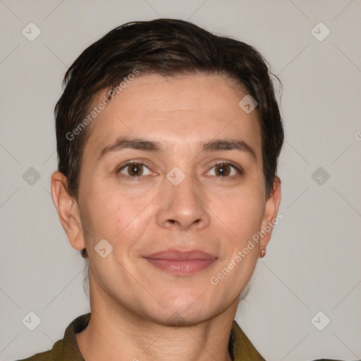 Joyful white adult male with short  brown hair and brown eyes