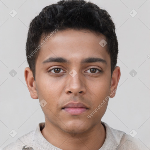 Neutral latino young-adult male with short  brown hair and brown eyes