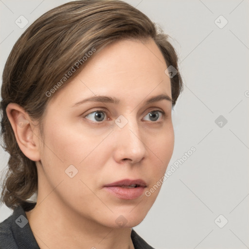 Neutral white young-adult female with medium  brown hair and grey eyes