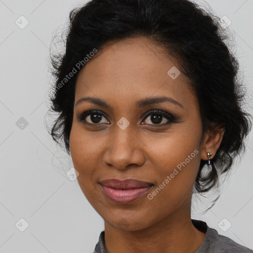 Joyful black young-adult female with medium  brown hair and brown eyes