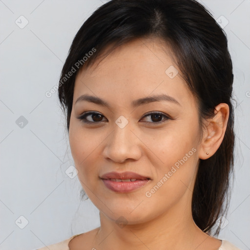 Joyful asian young-adult female with medium  brown hair and brown eyes