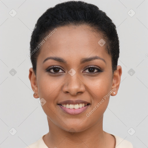 Joyful latino young-adult female with short  black hair and brown eyes