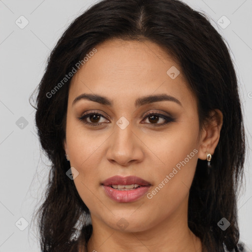 Joyful latino young-adult female with long  brown hair and brown eyes