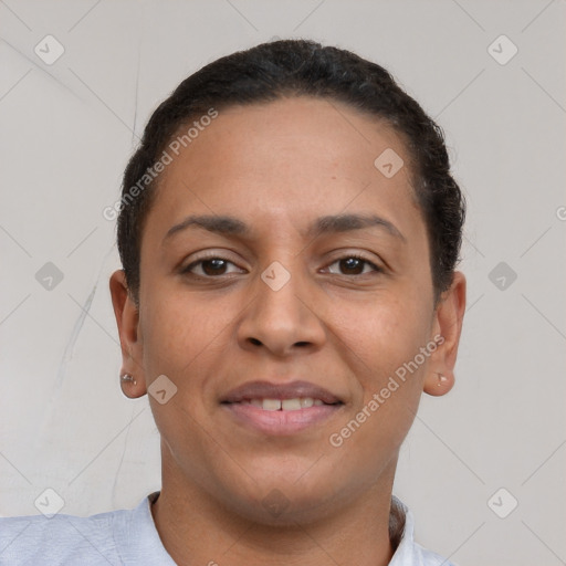 Joyful latino young-adult female with short  brown hair and brown eyes