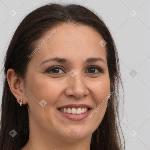 Joyful white young-adult female with long  brown hair and brown eyes