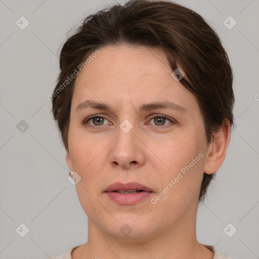 Neutral white adult female with short  brown hair and brown eyes