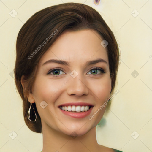 Joyful white young-adult female with medium  brown hair and green eyes