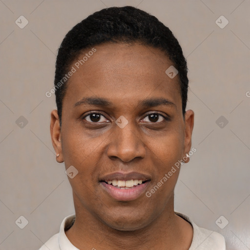 Joyful black young-adult male with short  black hair and brown eyes