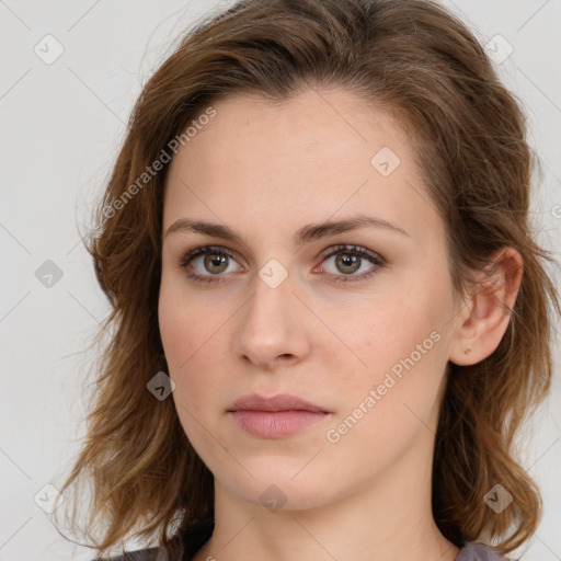 Neutral white young-adult female with long  brown hair and brown eyes