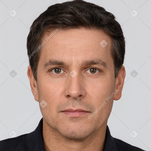 Neutral white adult male with short  brown hair and brown eyes