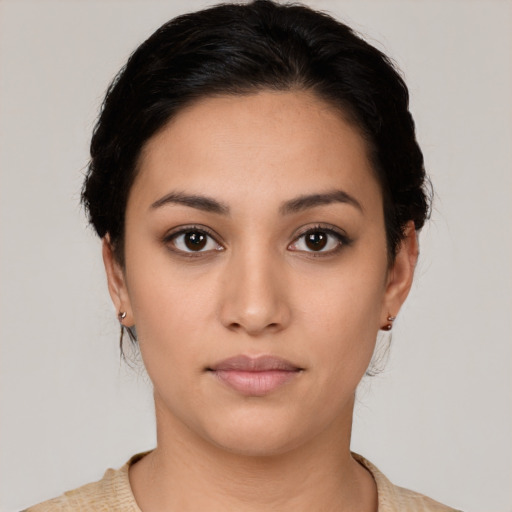 Neutral latino young-adult female with medium  black hair and brown eyes