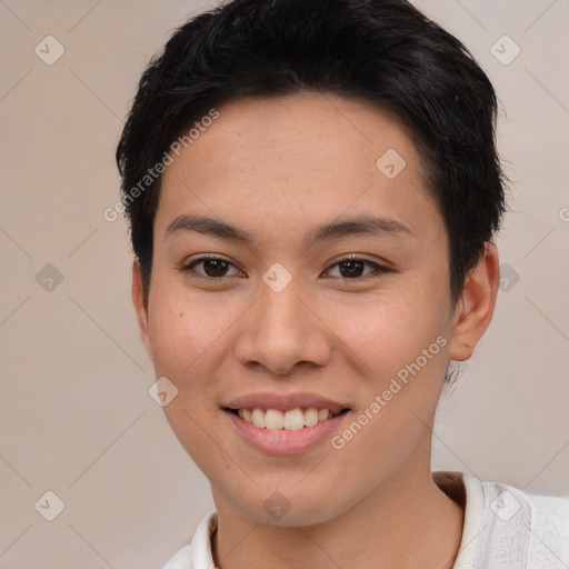 Joyful asian young-adult female with short  brown hair and brown eyes