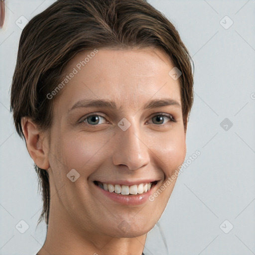 Joyful white young-adult female with short  brown hair and grey eyes