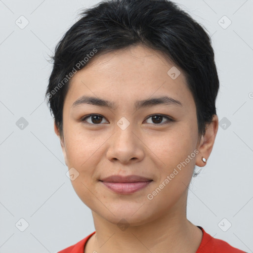 Joyful asian young-adult female with short  brown hair and brown eyes