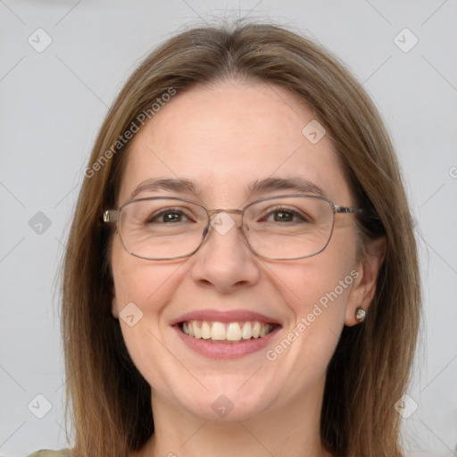 Joyful white adult female with medium  brown hair and grey eyes