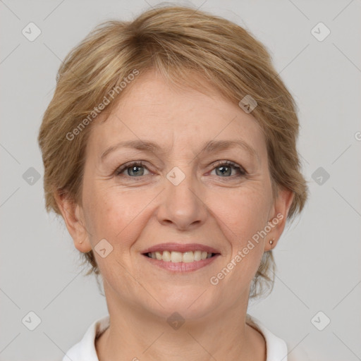 Joyful white adult female with short  brown hair and grey eyes